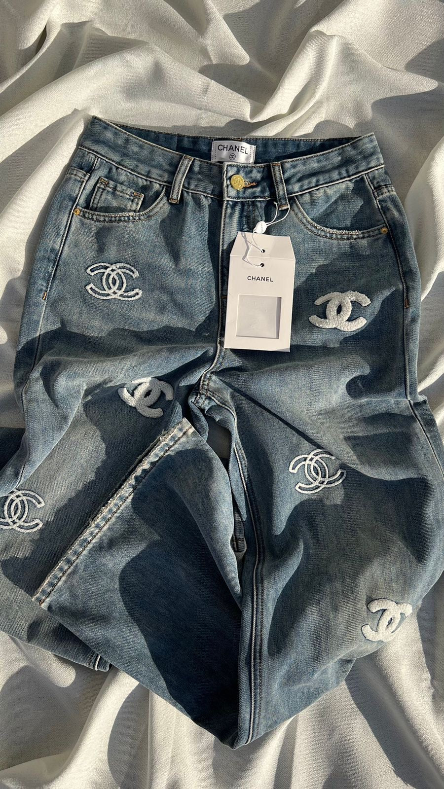 CHANEL PATCH JEANS